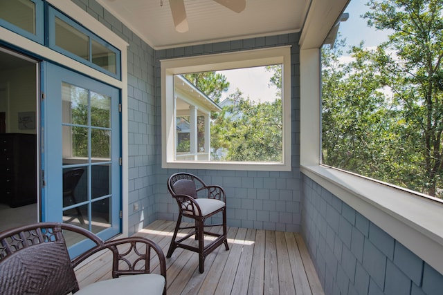 balcony featuring ceiling fan