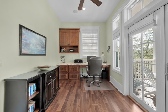 home office featuring ceiling fan and dark hardwood / wood-style flooring