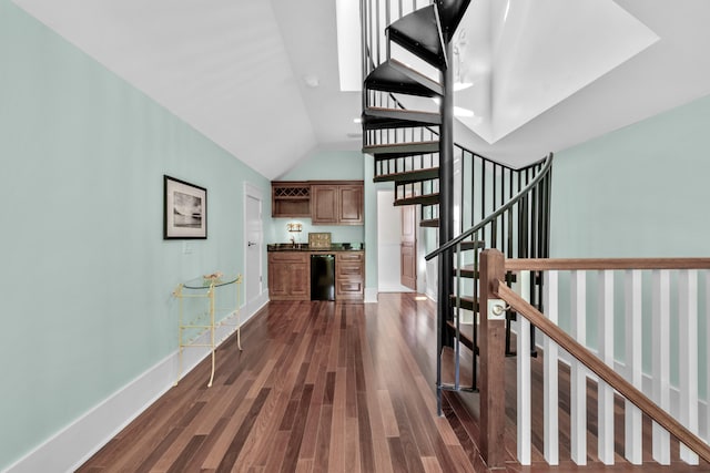 hallway featuring dark hardwood / wood-style flooring