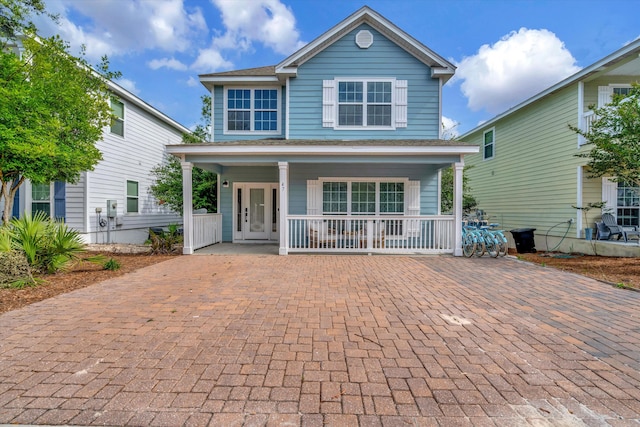 view of property with covered porch