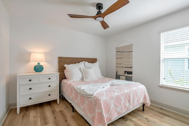 bedroom featuring ceiling fan and light wood-type flooring