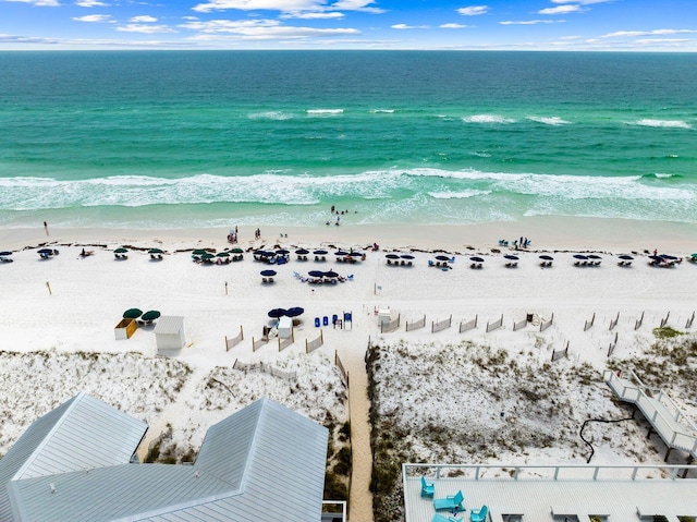 bird's eye view with a view of the beach and a water view