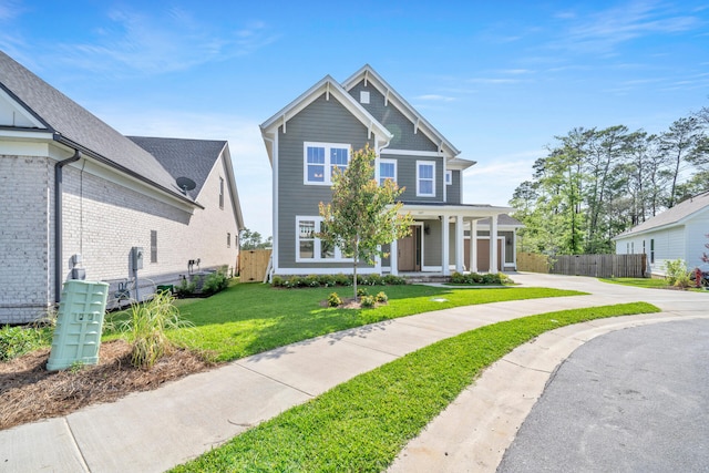 view of front of property with a front lawn