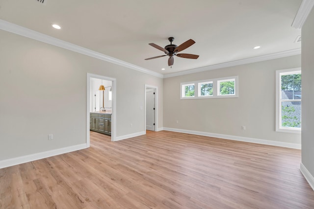 unfurnished room with ceiling fan, light hardwood / wood-style floors, and ornamental molding