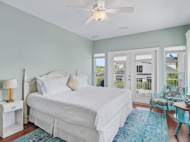 bedroom with access to outside, ceiling fan, and hardwood / wood-style floors