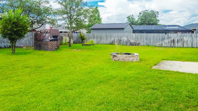 view of yard with a fenced backyard