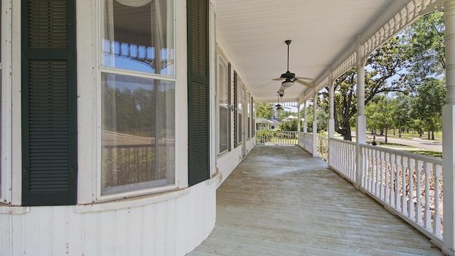 wooden terrace with ceiling fan