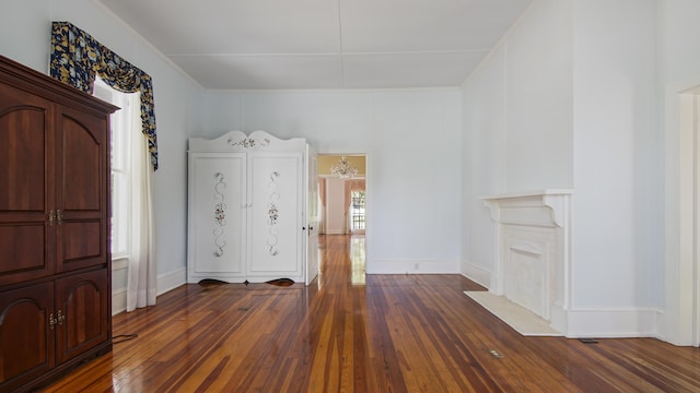 entryway with dark wood-type flooring