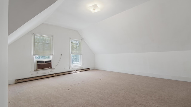 bonus room with lofted ceiling, a baseboard heating unit, cooling unit, and light colored carpet