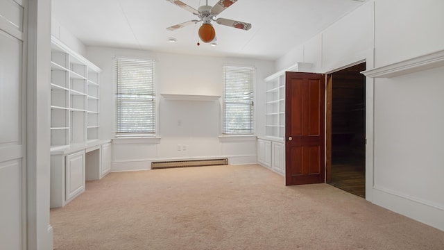 interior space featuring ceiling fan