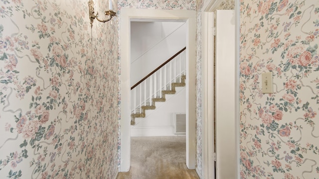 stairway with carpet floors