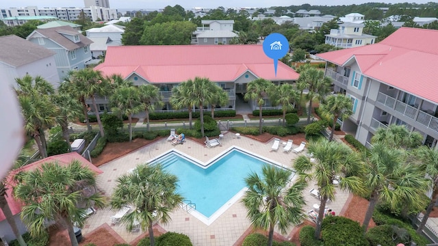 view of swimming pool featuring a patio area