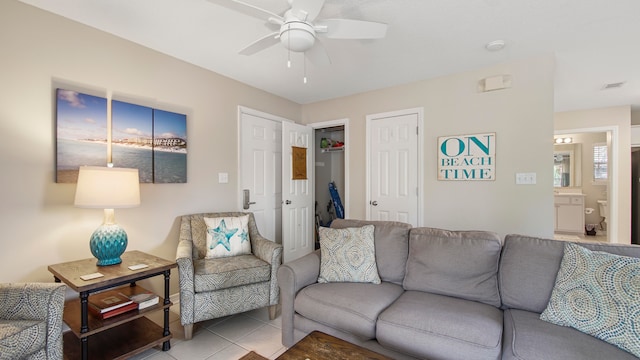 living room with tile flooring and ceiling fan