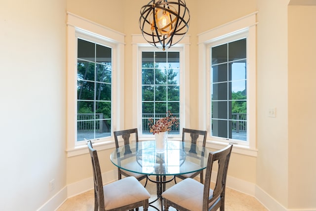 dining area featuring a chandelier