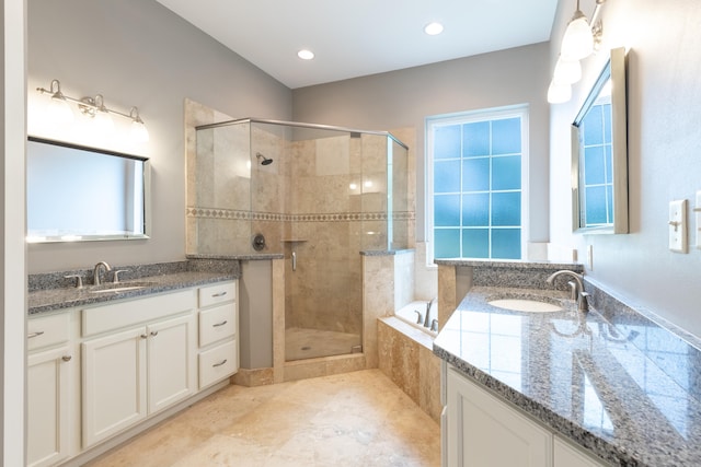 bathroom with vanity, tile floors, and separate shower and tub