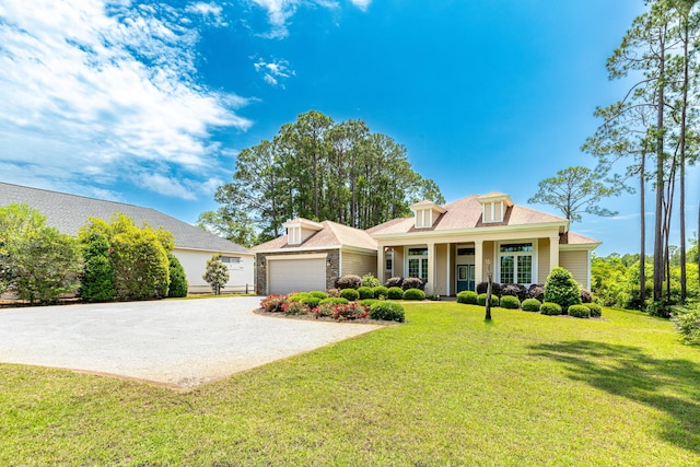 view of front facade with a garage and a front yard