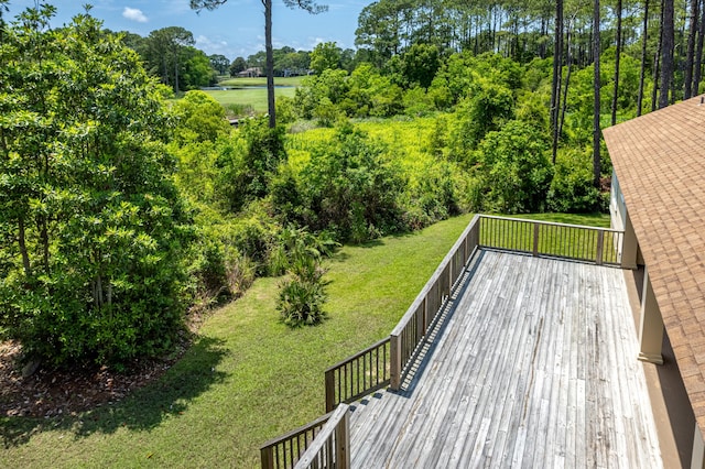 deck featuring a lawn