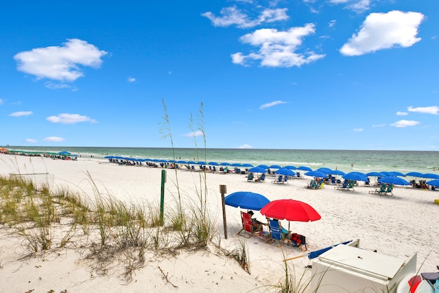 property view of water featuring a beach view