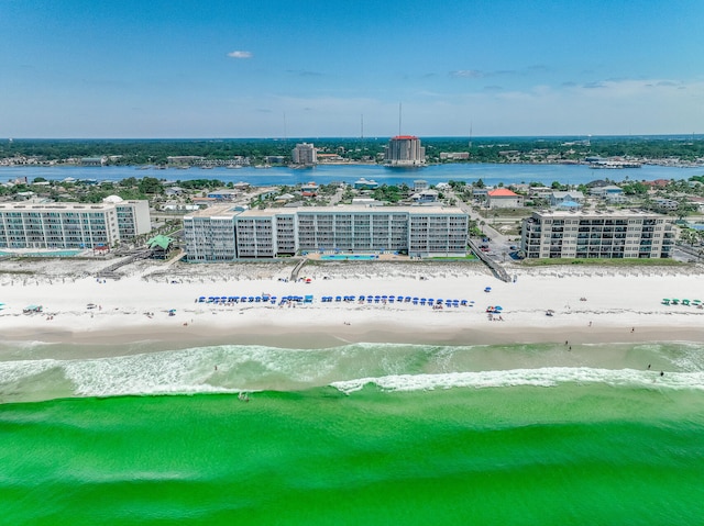 aerial view with a view of the beach and a water view