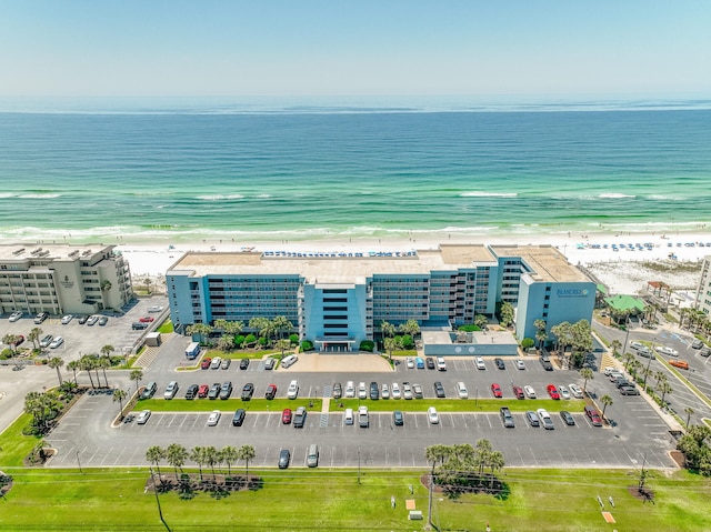 aerial view with a beach view and a water view