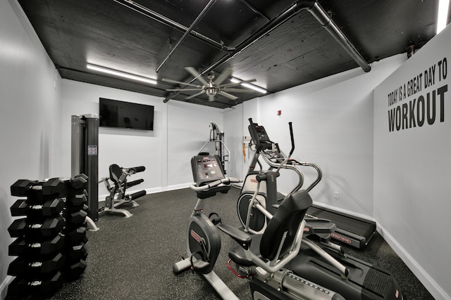 exercise room with ceiling fan