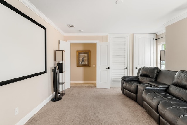 living room with ornamental molding and light carpet