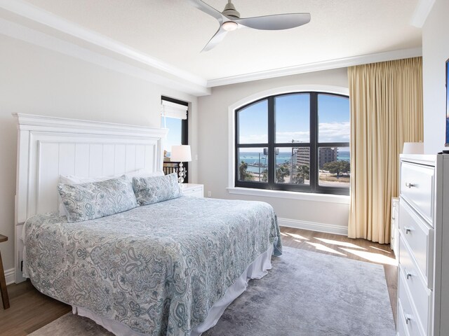 bedroom featuring hardwood / wood-style floors and ceiling fan