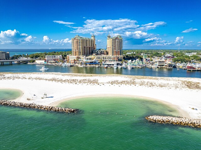 bird's eye view with a view of the beach and a water view