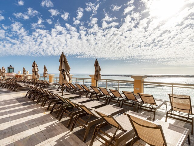 view of patio / terrace with a water view