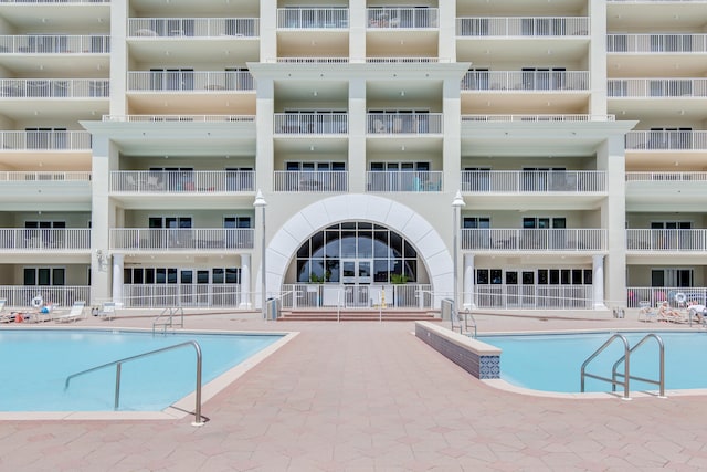 view of pool featuring a patio