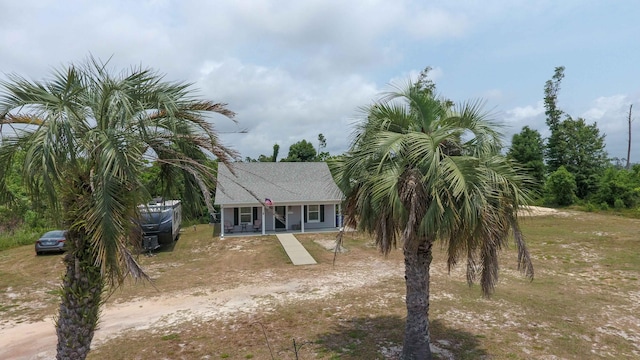 view of front of property featuring covered porch