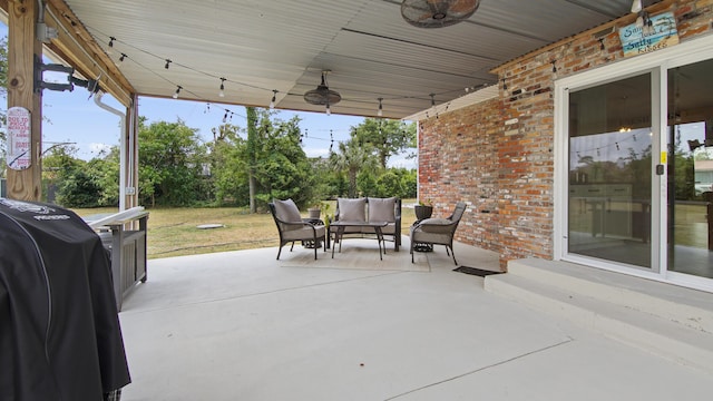 view of patio with outdoor lounge area and area for grilling