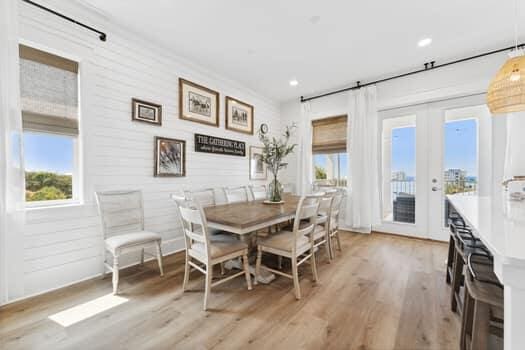 dining room featuring light hardwood / wood-style floors and french doors