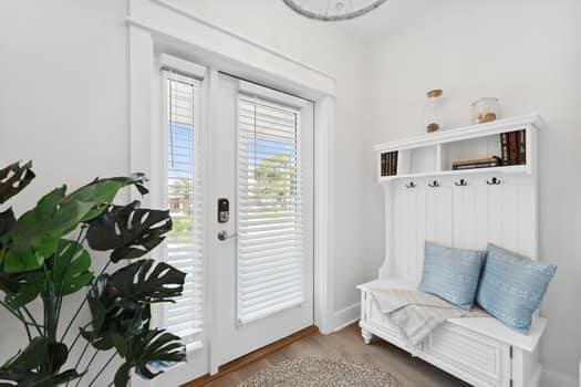 mudroom with hardwood / wood-style flooring