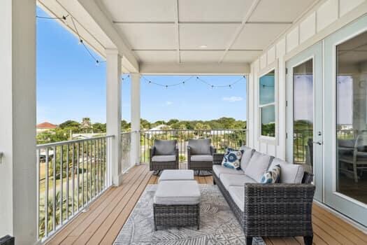 wooden terrace featuring an outdoor living space