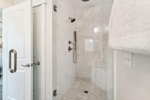 bathroom featuring walk in shower