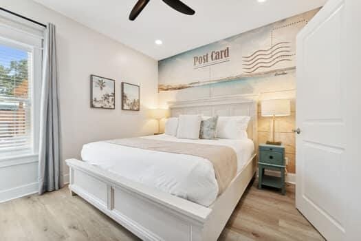 bedroom with ceiling fan and light wood-type flooring