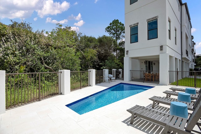 view of pool with a patio