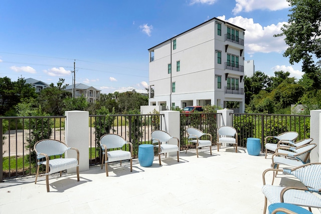 view of patio / terrace with a balcony