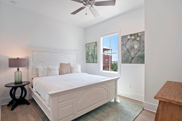 bedroom featuring ceiling fan and wood-type flooring