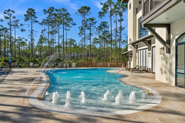 pool featuring a patio