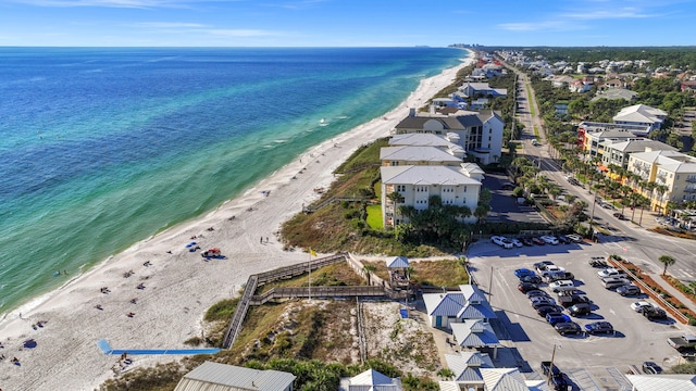 aerial view featuring a water view and a view of the beach