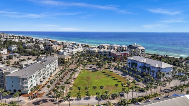 aerial view featuring a water view and a beach view