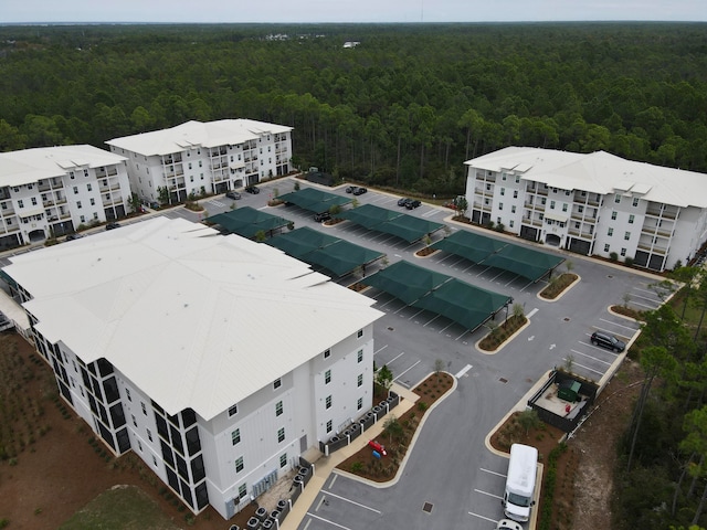 bird's eye view with a forest view