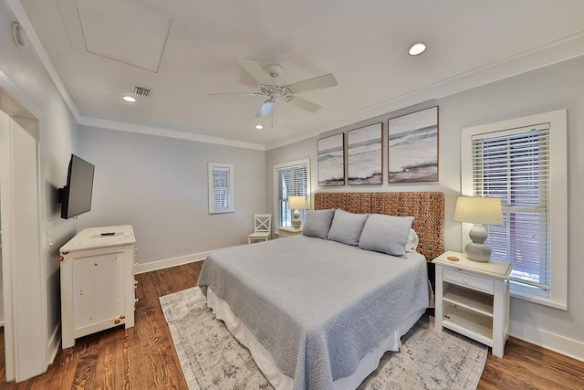 bedroom featuring ornamental molding, dark hardwood / wood-style floors, and ceiling fan