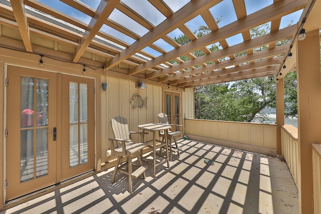 view of patio / terrace with a pergola and french doors