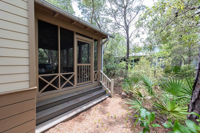 deck with a sunroom