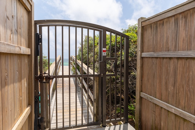 view of gate featuring a water view