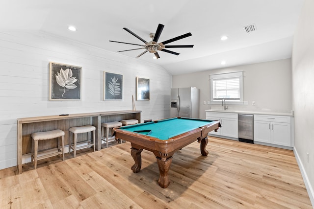 playroom with ceiling fan, light hardwood / wood-style flooring, billiards, sink, and lofted ceiling