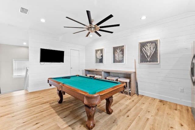 game room with wooden walls, pool table, ceiling fan, and light wood-type flooring